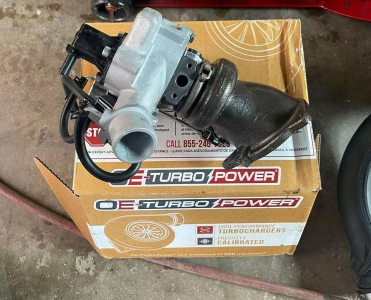 Turbocharger on a box labeled 