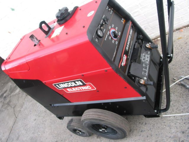 A lincoln electric welding machine on wheels