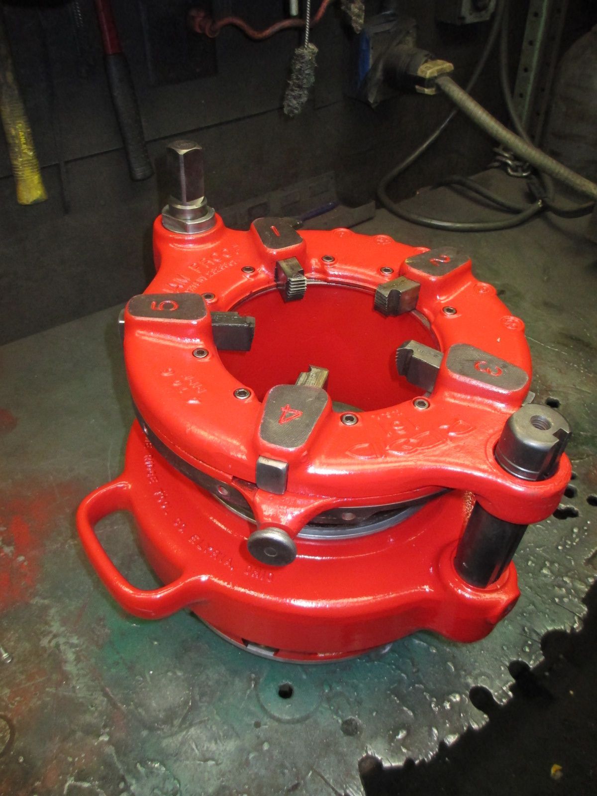 A red tool with the letter a on it