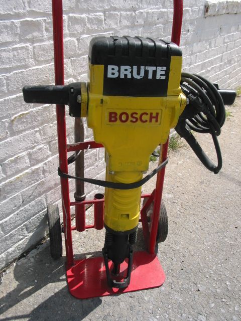 A bosch brute hammer is on a cart