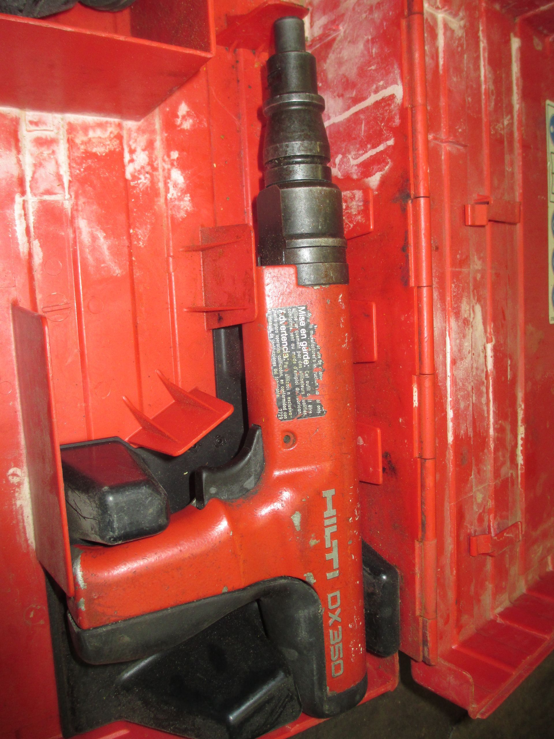A red tool with the word hilti on it
