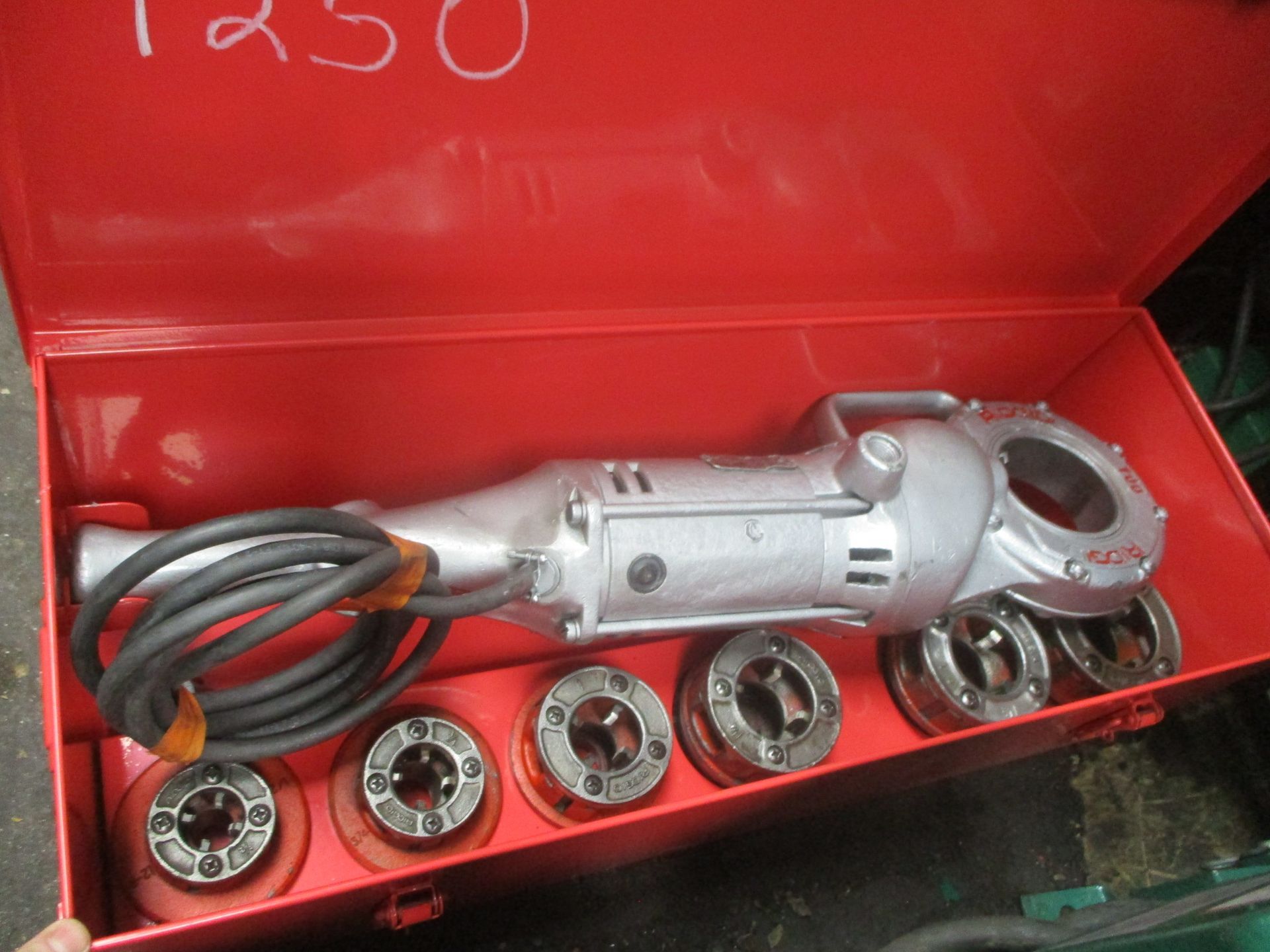 A red box with a tool inside of it with the number 1250 written on it