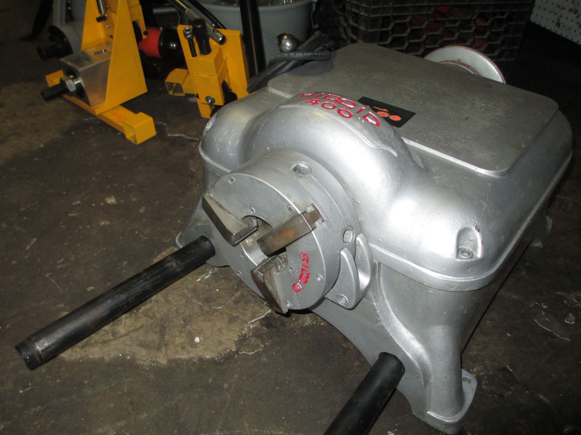 A machine is sitting on the floor with a sticker on it that says ' a ' on it