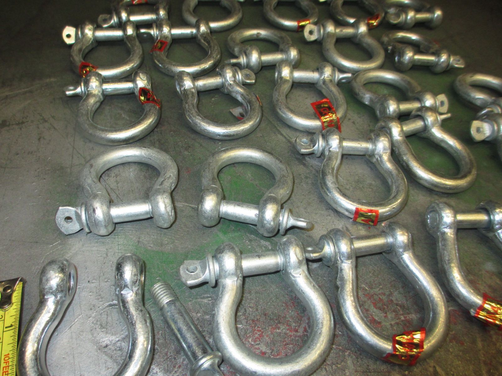 A bunch of different types of shackle on a table