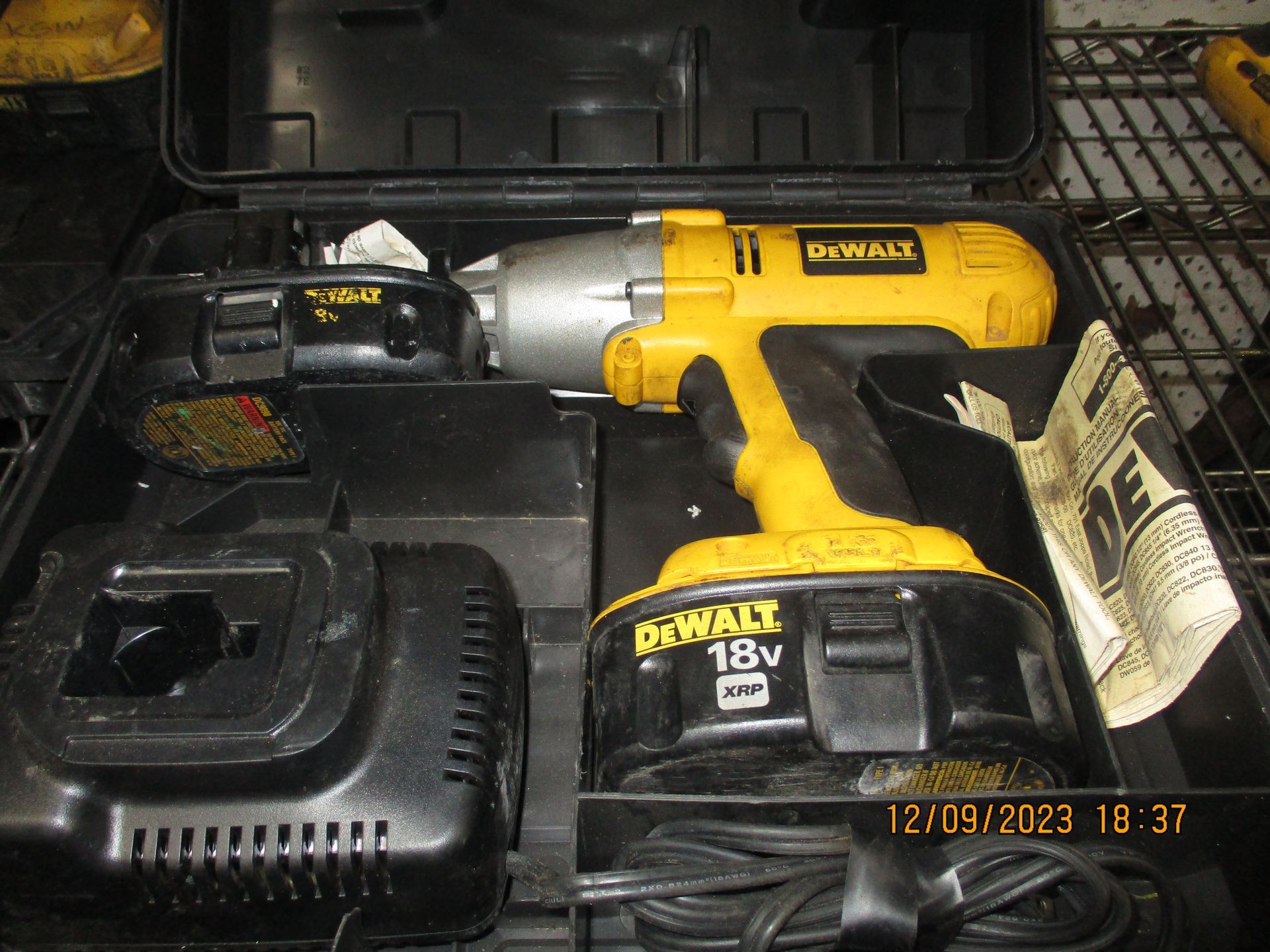 A dewalt 18v cordless drill in a case