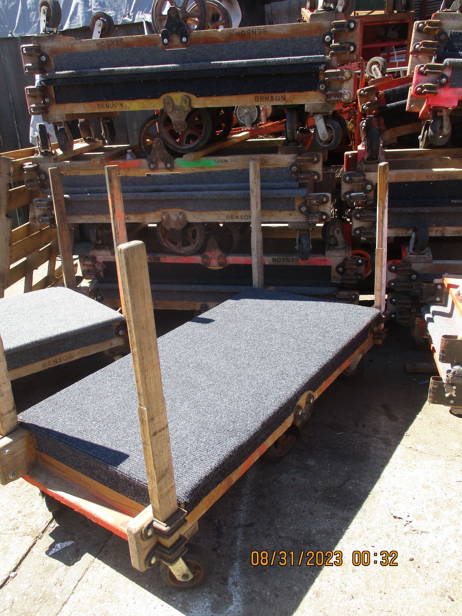 A bunch of carts are stacked on top of each other