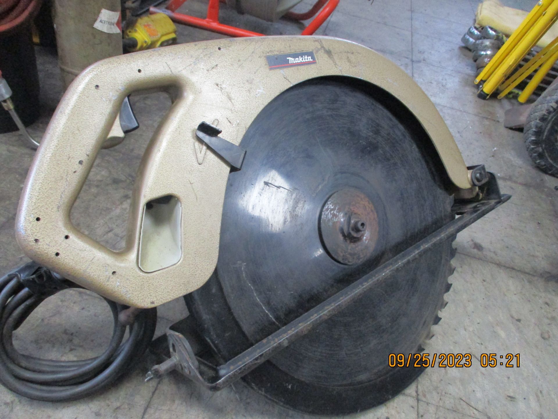 A circular saw with a cord attached to it