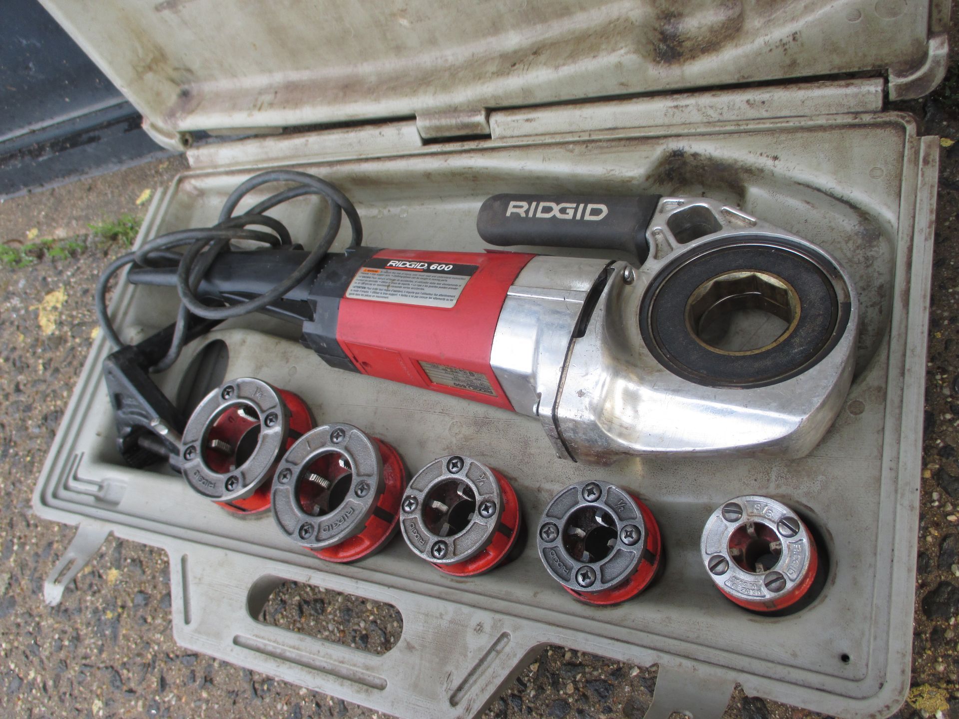 A tool in a case that says ridgid on it