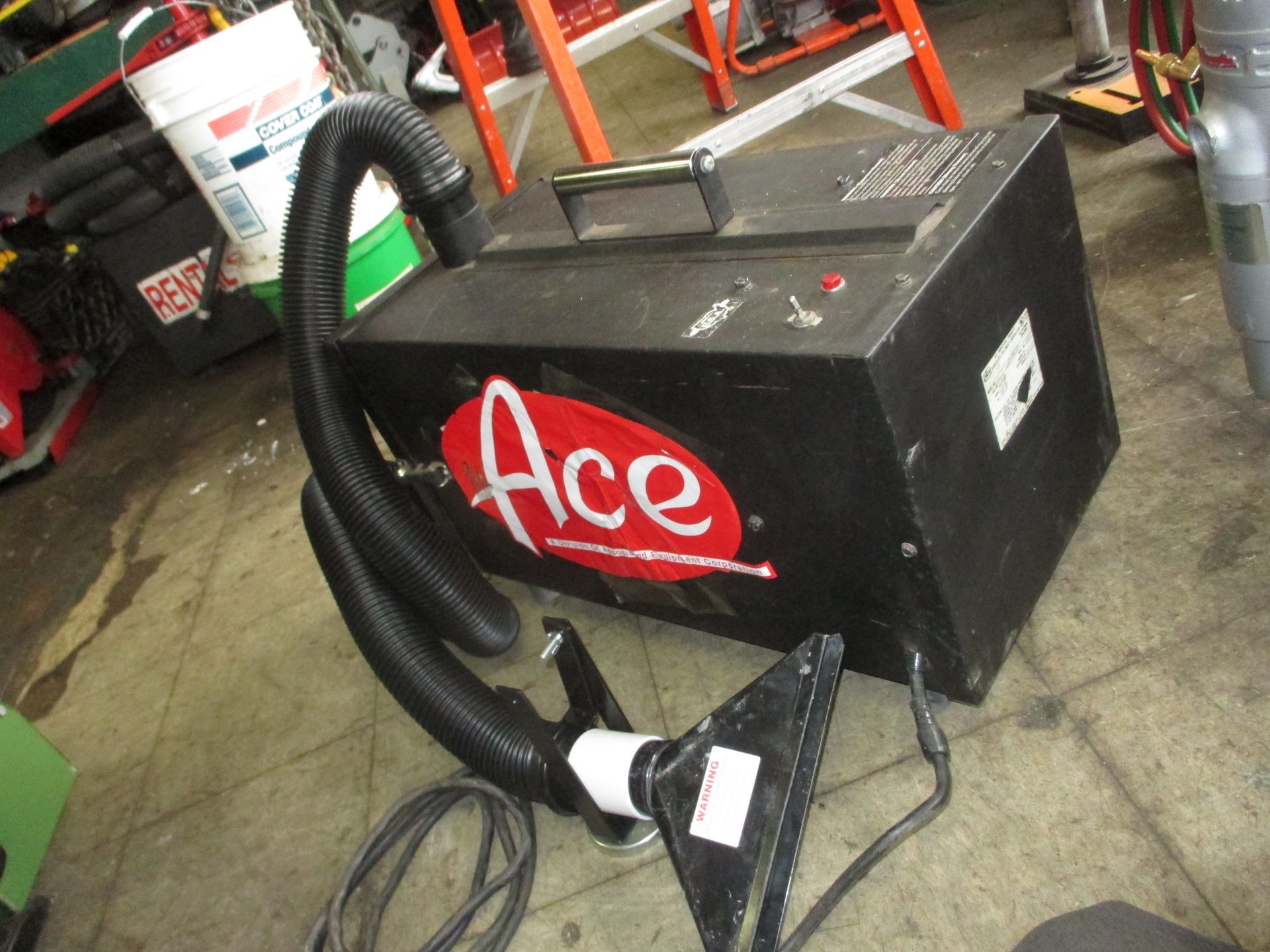 A black box with the word ace on it