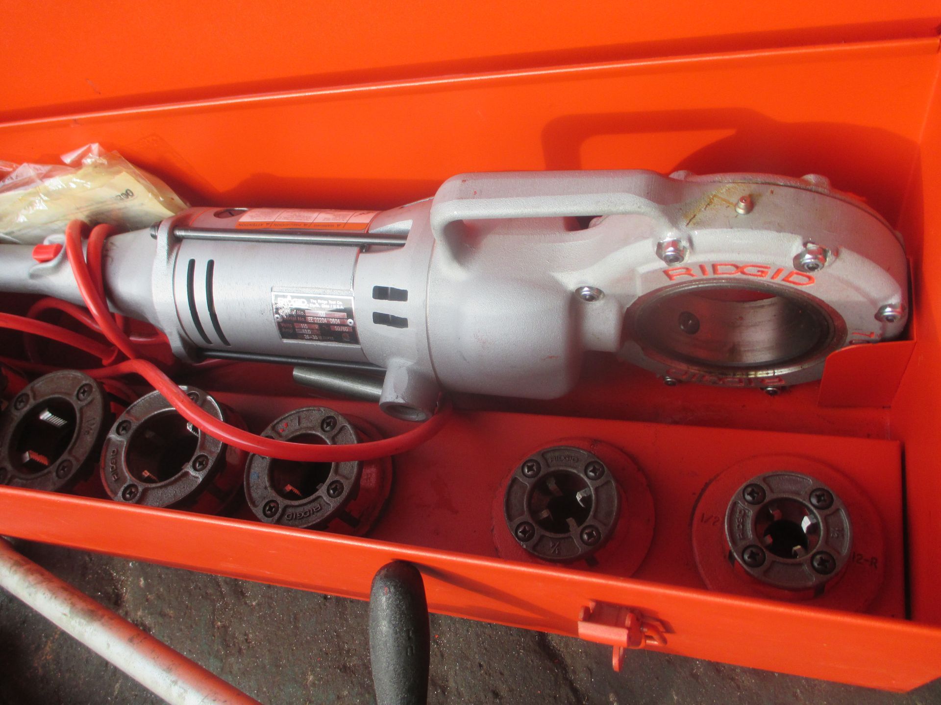 A toolbox with a machine in it that says ' valentine ' on it