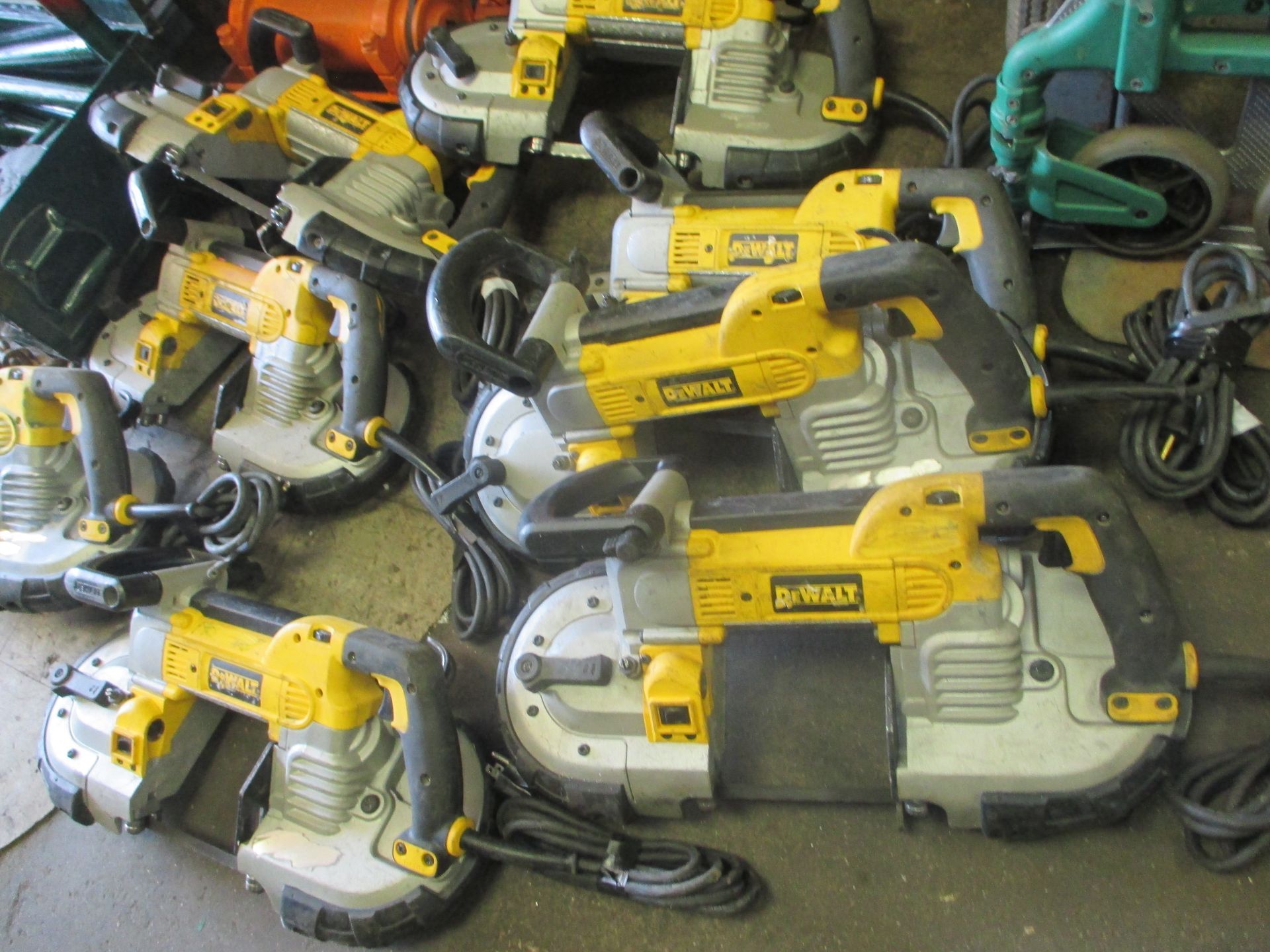 A bunch of dewalt tools are sitting on a table