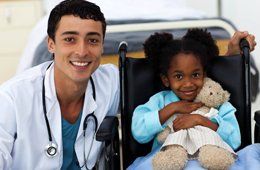 Pediatrician with a child