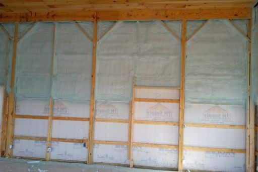 A room with a wooden frame and foam on the walls.