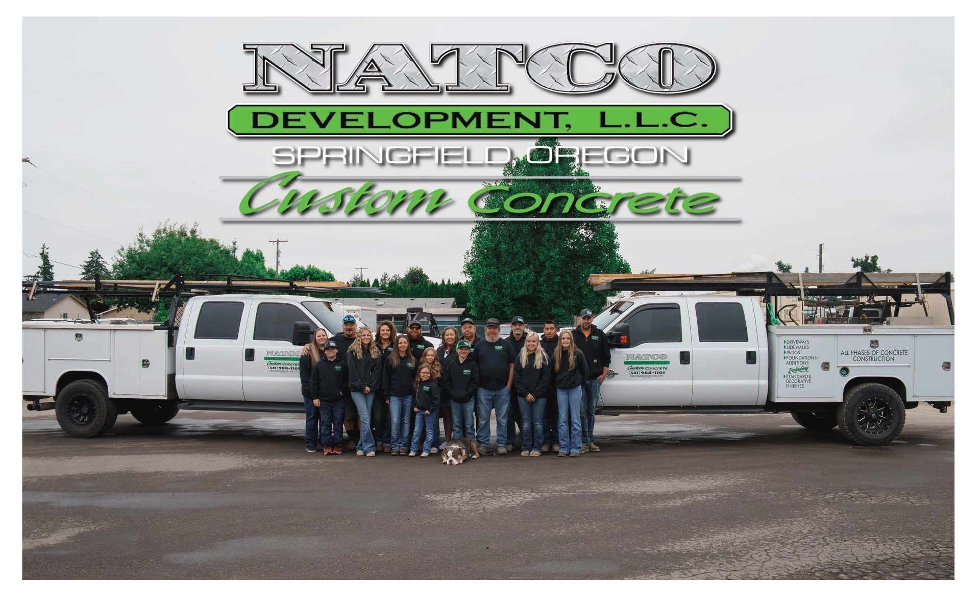 Natco Development crew standing between two white work trucks, Springfield, Oregon.