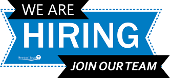A blue sign that says we are hiring, join our team