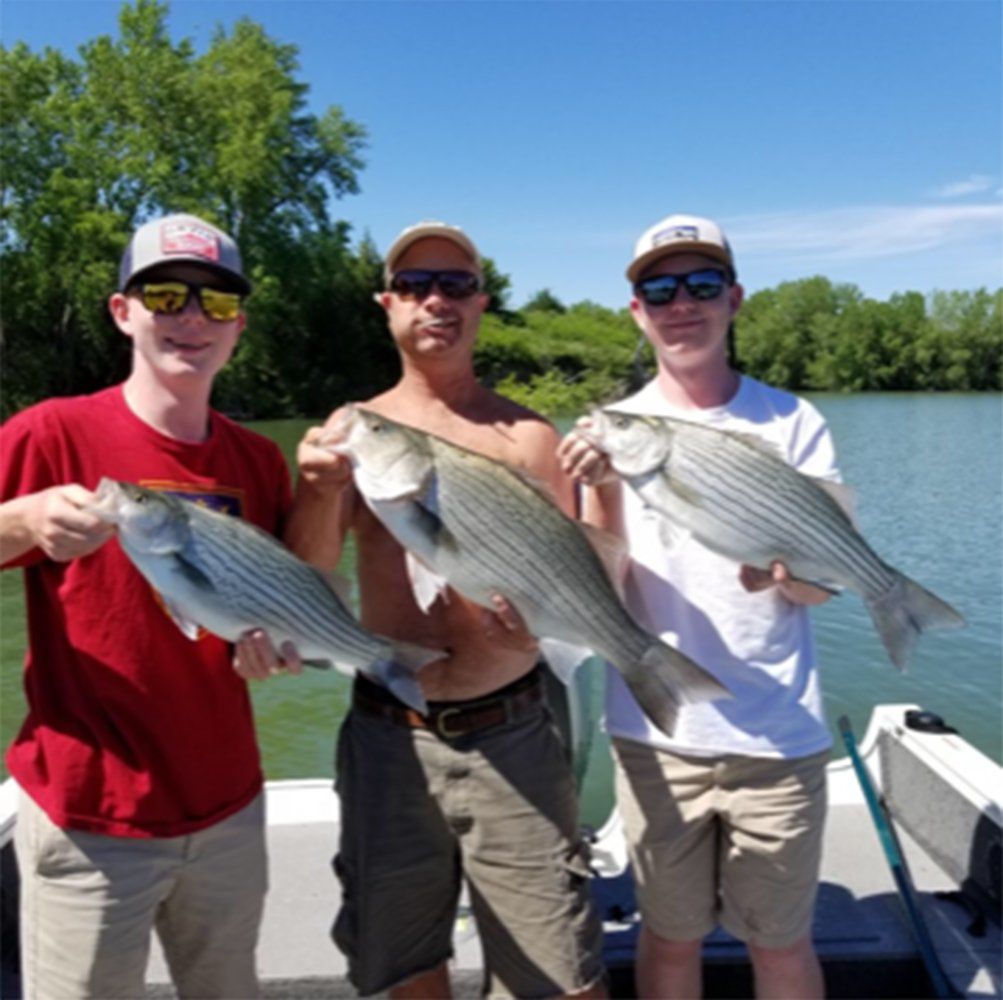 Men who caught big fishes