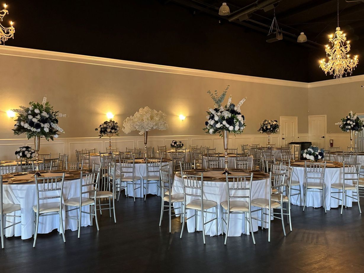 A large room with tables and chairs