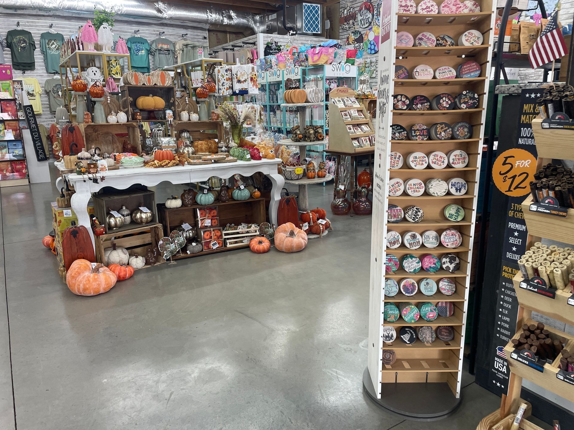 A shop interior filled with autumn decorations and souvenirs.