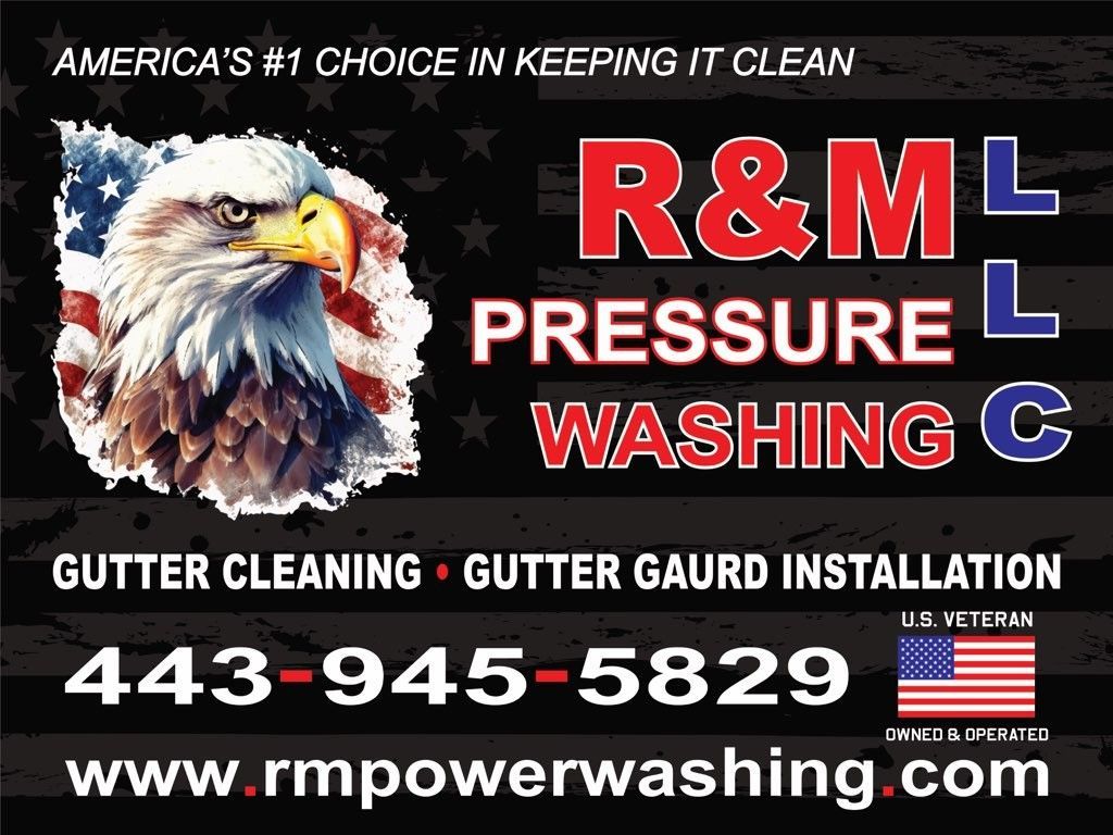 A sign for r & m pressure washing with an eagle on it.
