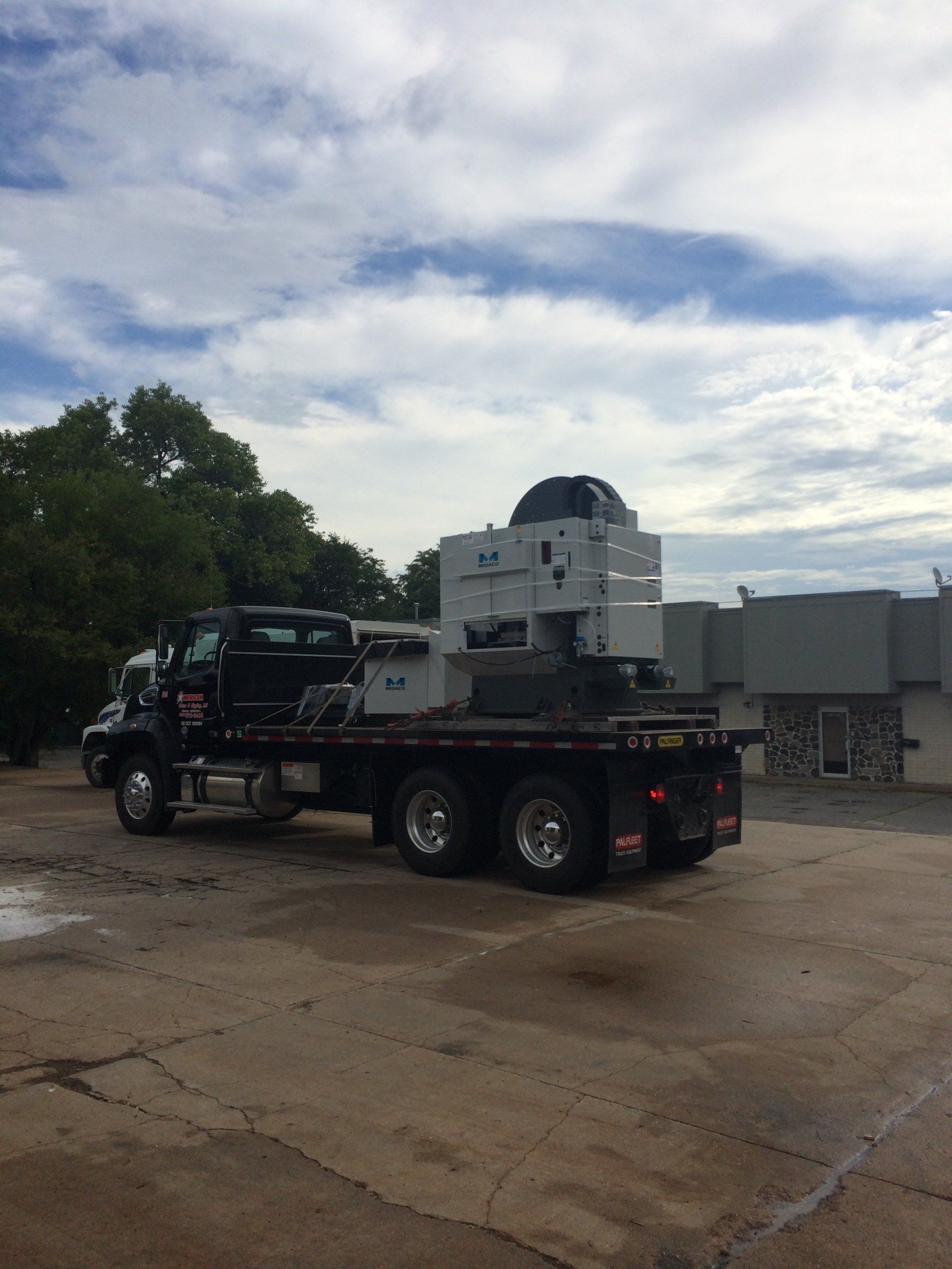 Truck carrying Machinery