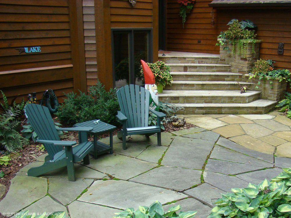 A patio with a sign that says lake on it