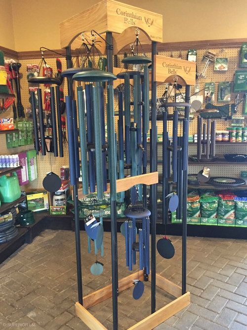 A display of wind chimes in a store.