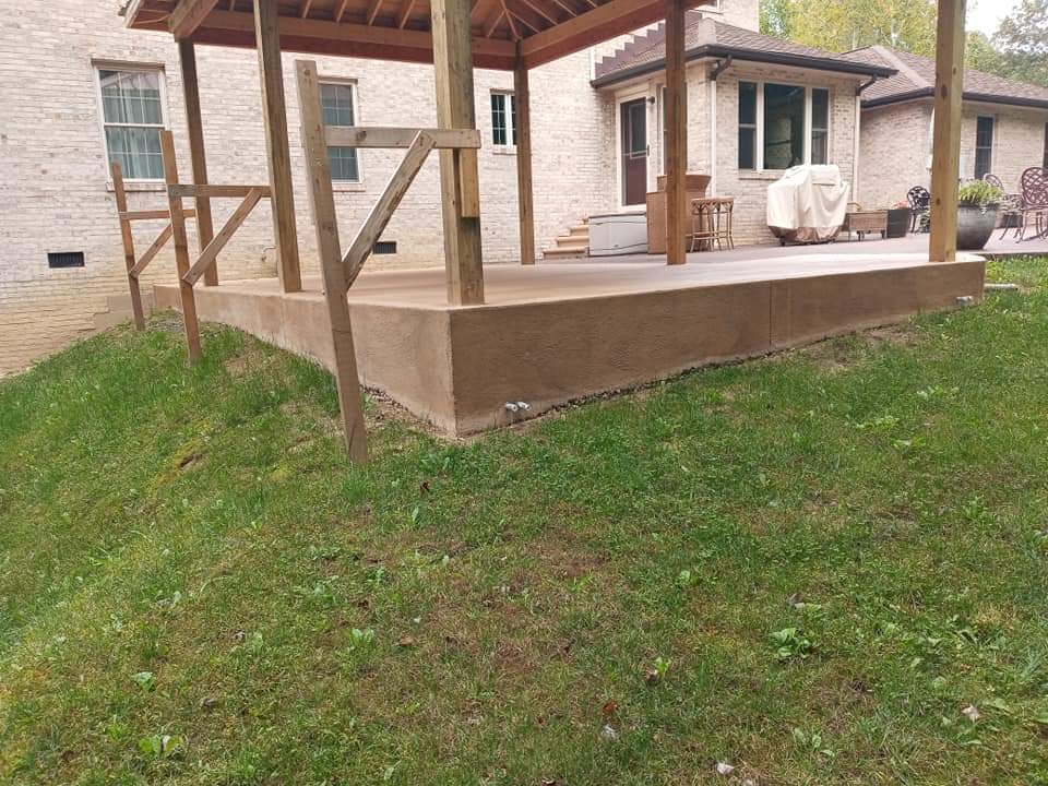 Concrete patio with a covered space
