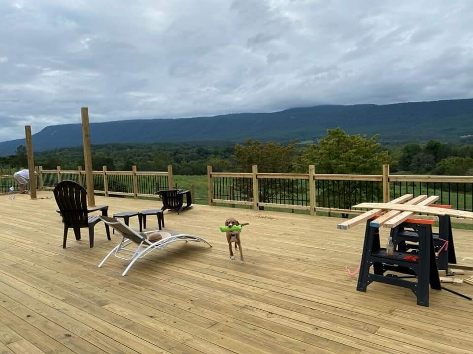 Spacious wooden deck with a beautiful outdoor view
