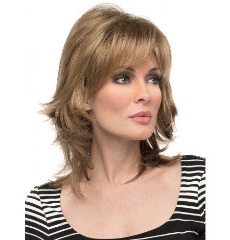 A woman wearing a wig and a striped shirt