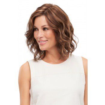 A woman wearing a wig and a white tank top