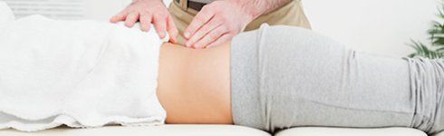 chiropractor doing a back massage