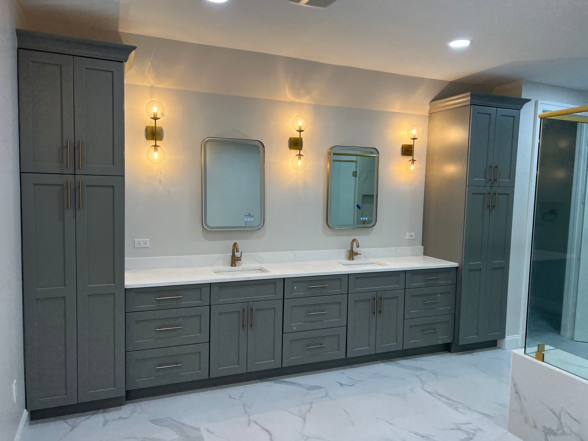 A bathroom with two sinks and two mirrors