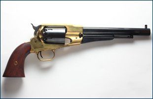 Antique pistol on a plain background