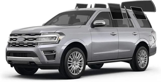 Silver Ford Expedition SUV angled on a plain white background.