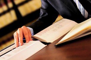 Lawyer reading a book