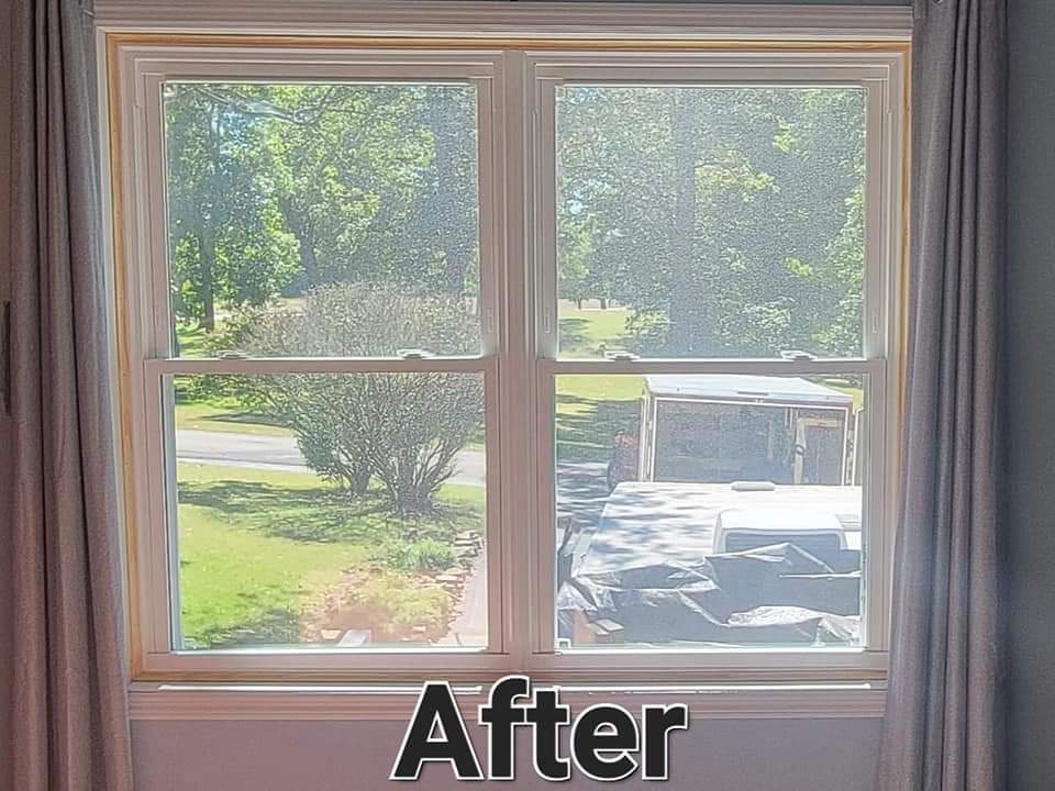 A picture of a window after being installed in a living room.
