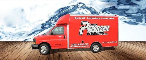 Red moving truck with “Fresh Air Heating & Cooling” branding on a wooden deck, snowy mountains behind.