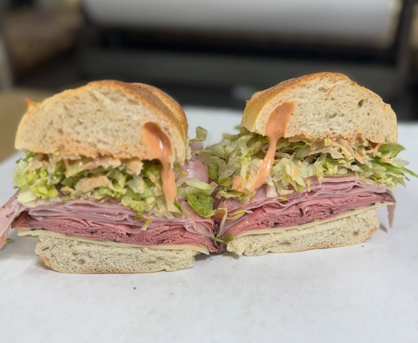 The Flanders. Ham, roast beef, Swiss cheese, lettuce, tomatoes, onions, spices and our signature russian dressing.
