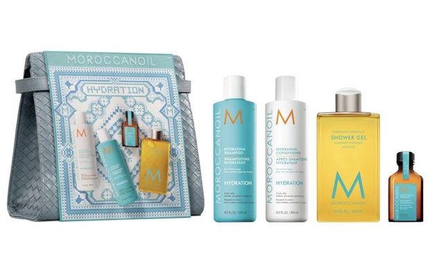 Moroccanoil Hydration gift set. Includes bag and bottles of hair products in turquoise and gold.
