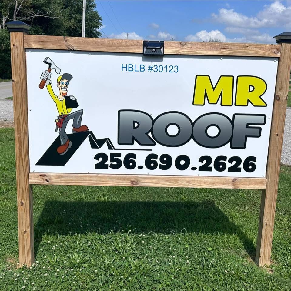 Mr. Roof sign with cartoon roofer holding a hammer and axe. Phone number 256.690.2626.