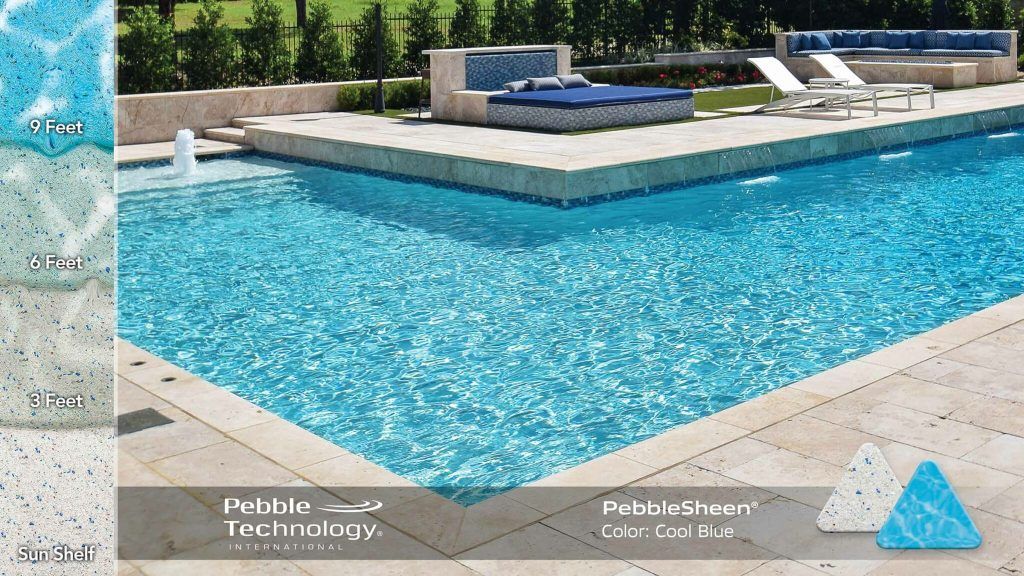 Pool with blue water and stone deck, showcasing pebble technology.