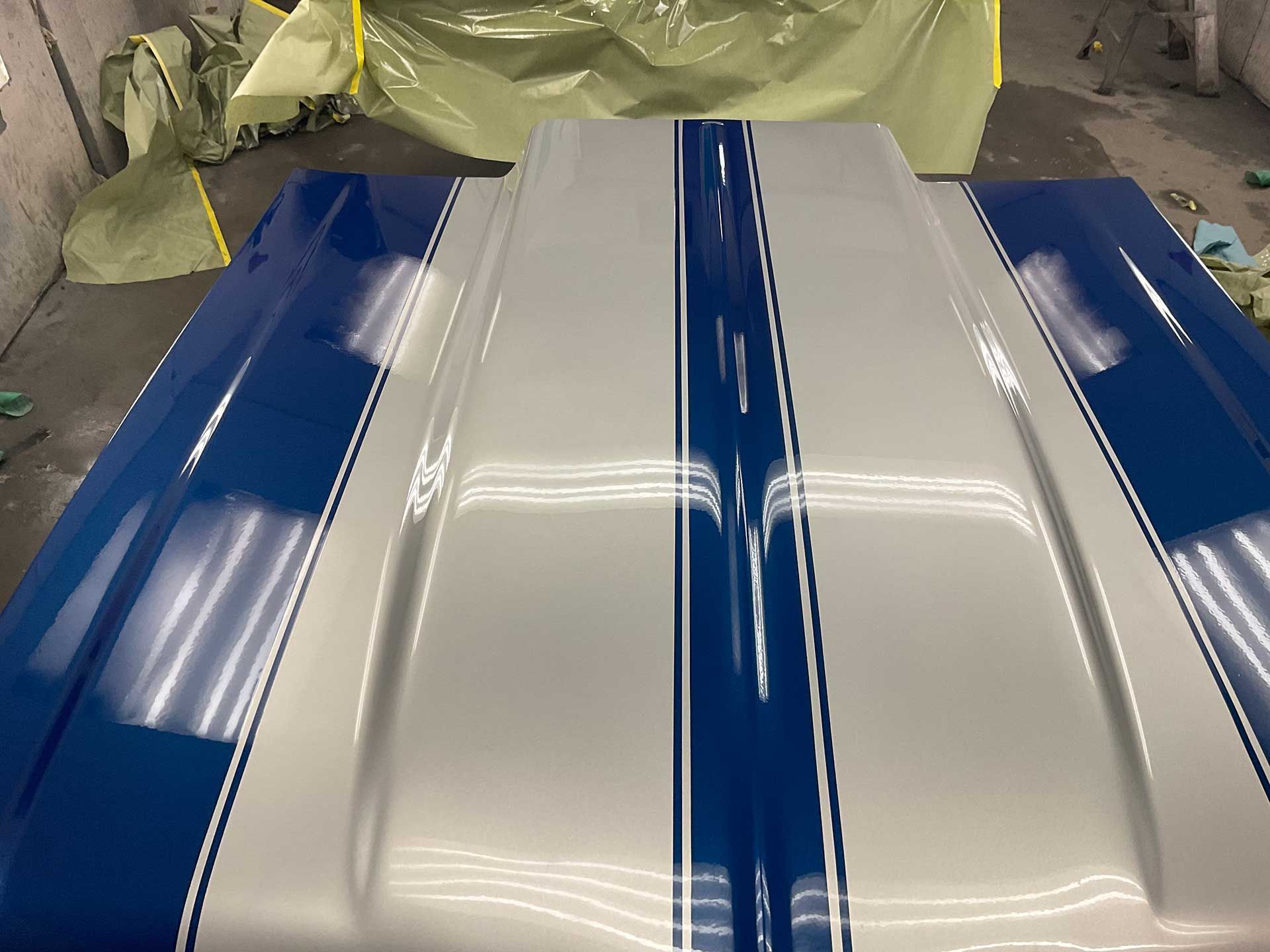 a blue and silver hood