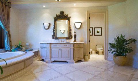 Bathroom with tub and elegant mirror
