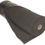 A large roll of black landscape fabric or weed barrier material against a plain white background.