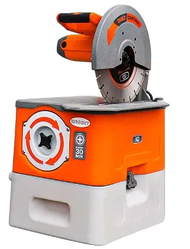 Orange and grey portable masonry table saw with a circular cutting blade on a white base.