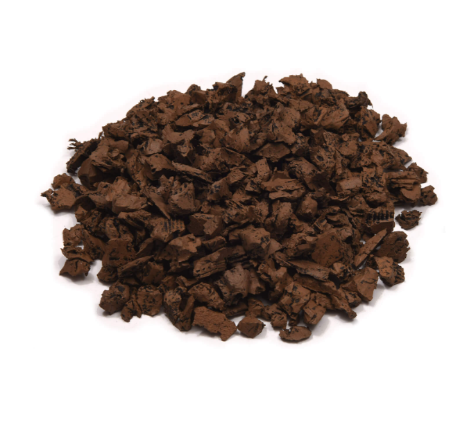 Pile of Cypress rubber mulch on a white background