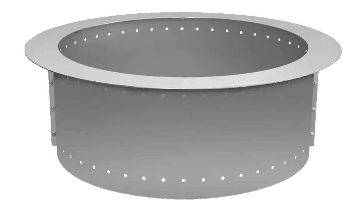 A circular, gray metal fire pit ring with a wide top rim and ventilation holes along the top and bottom edges.