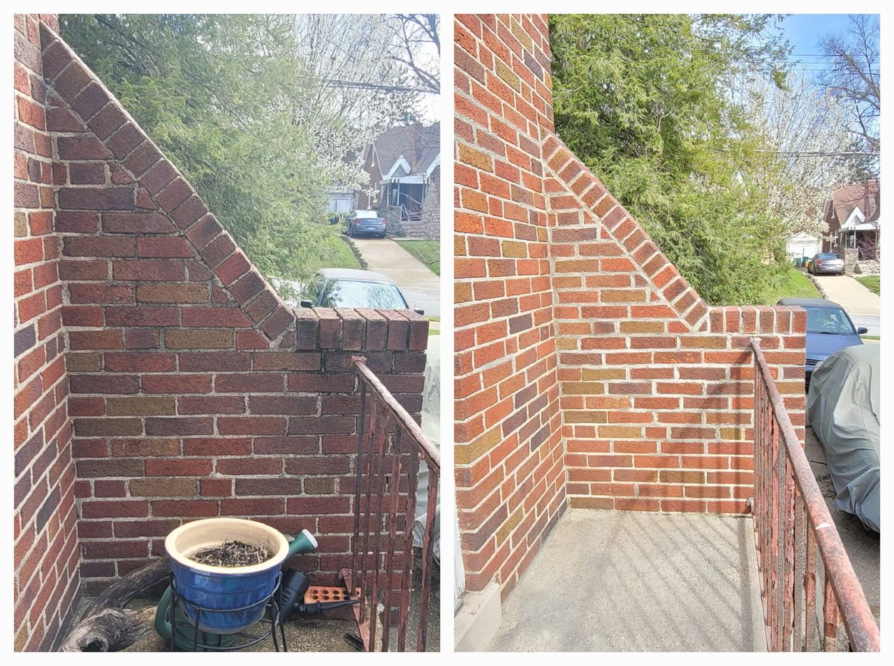Brick exterior with a slanted wall, railing, and a view of the street.
