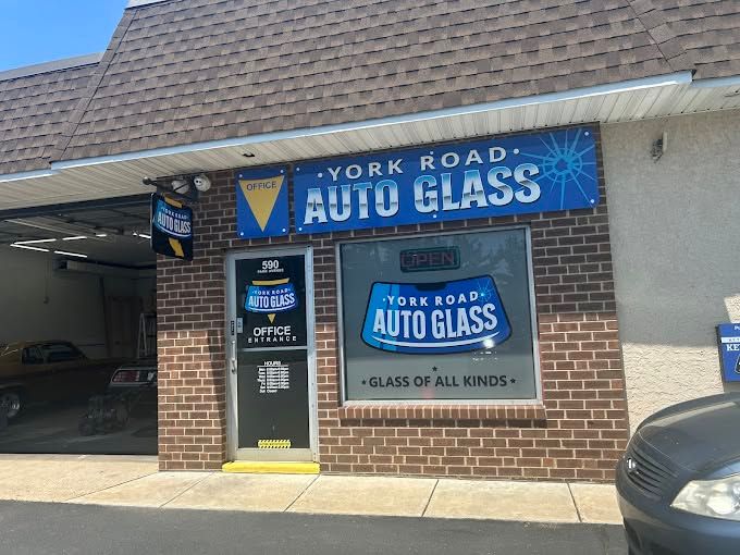 York Road Auto Glass storefront with blue signage and brick exterior
