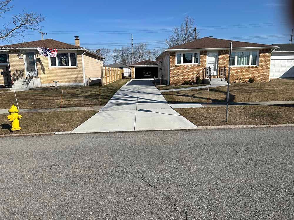 A brick house with a fire hydrant in front of it.